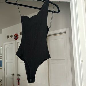 Asymmetrical body suit